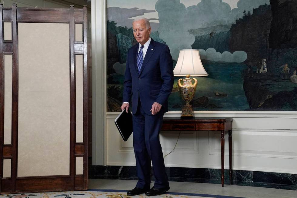 President Joe Biden pauses after speaking in the Diplomatic Reception Room of the White House, ...