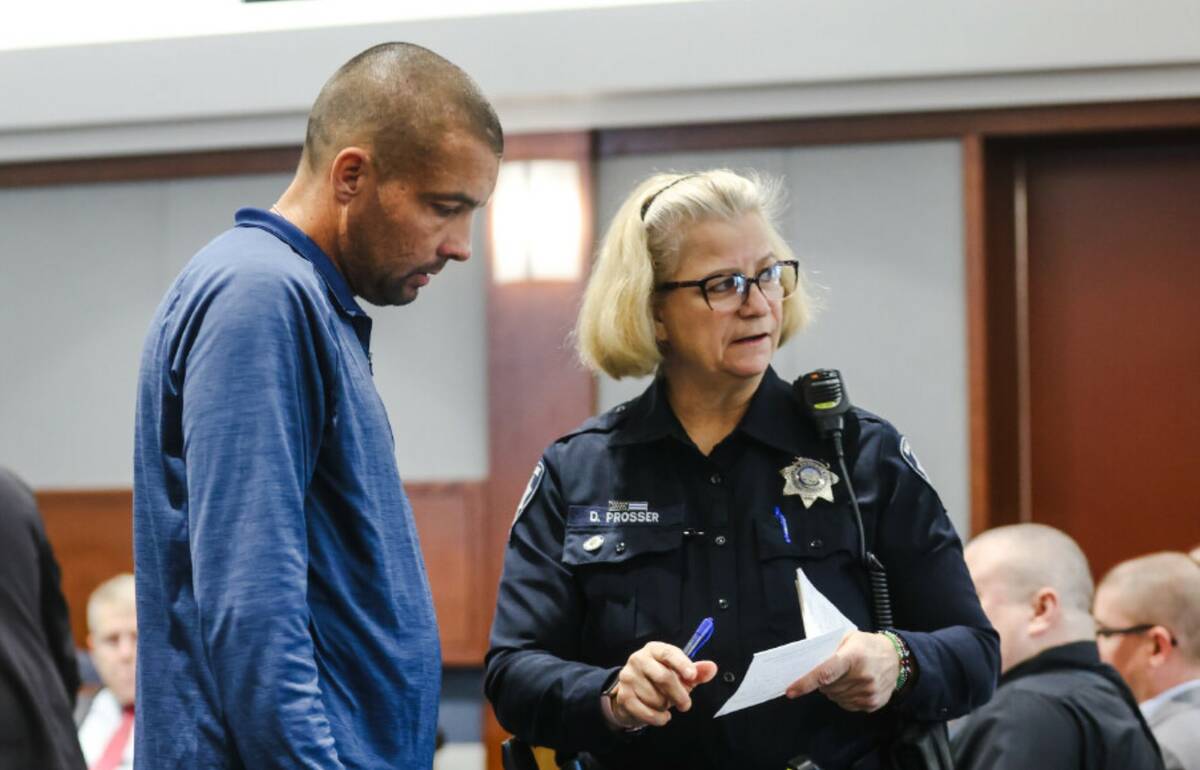 Sean Larimer speaks with the bailiff after his sentencing regarding a recent DUI crash he plead ...