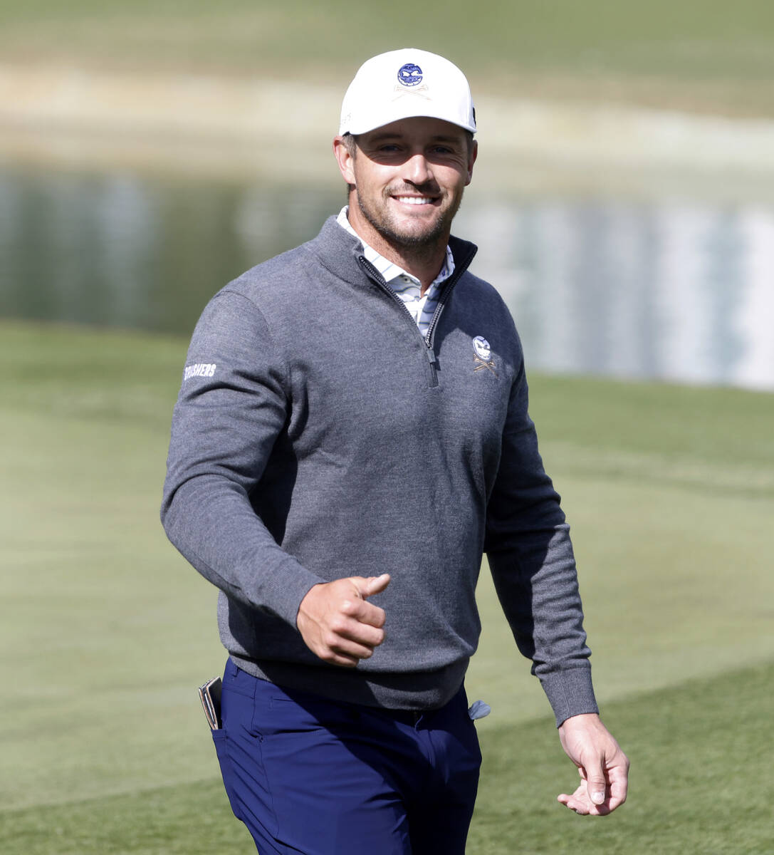 Bryson Dechambeau of team Crushers GC acknowledges the crowd after putting in on the 9th green ...