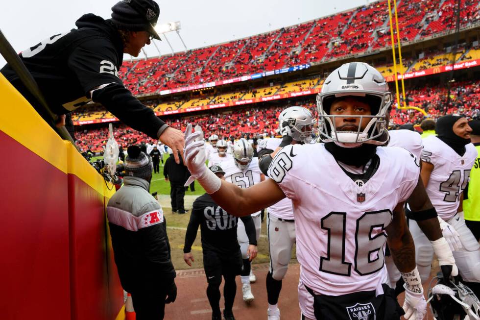 Las Vegas Raiders wide receiver Jakobi Meyers (16) greets fans as he leaves the field after war ...