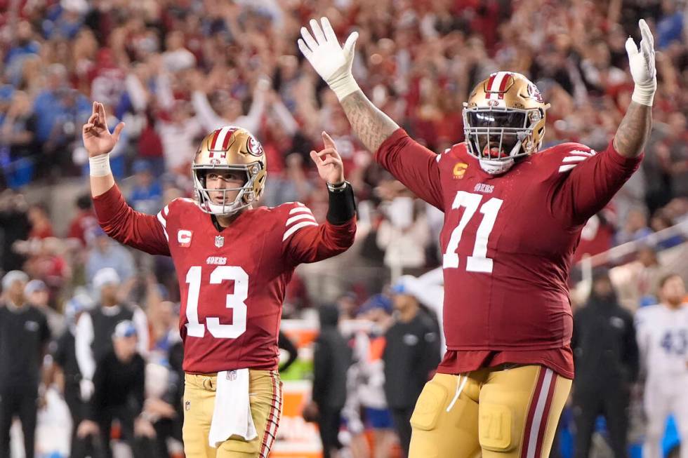 San Francisco 49ers quarterback Brock Purdy (13) and offensive tackle Trent Williams (71) celeb ...