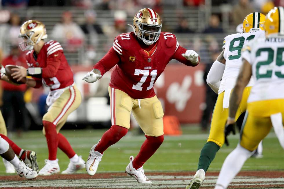 San Francisco 49ers offensive tackle Trent Williams (71) blocks during an NFL divisional round ...