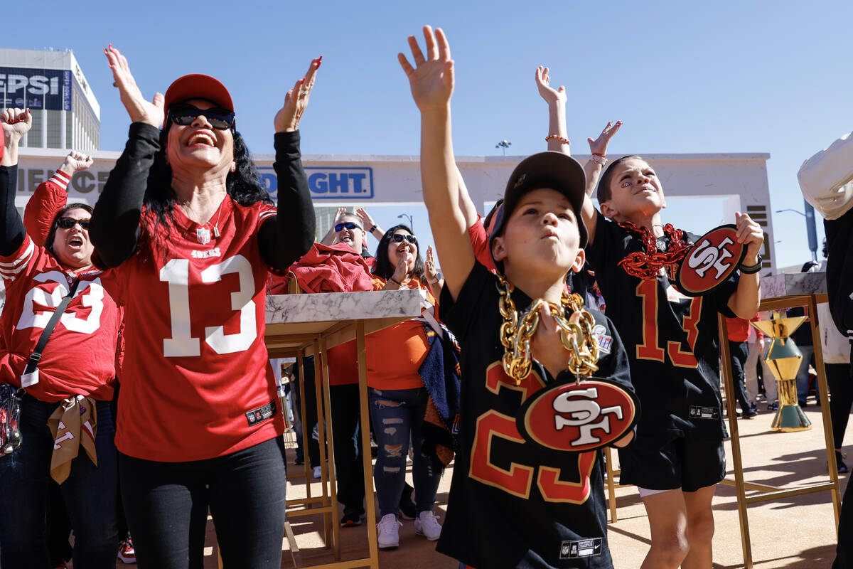 San Francisco 49ers fans cheer for souvenirs Sunday, February 11, 2024, before Super Bowl 58 at ...