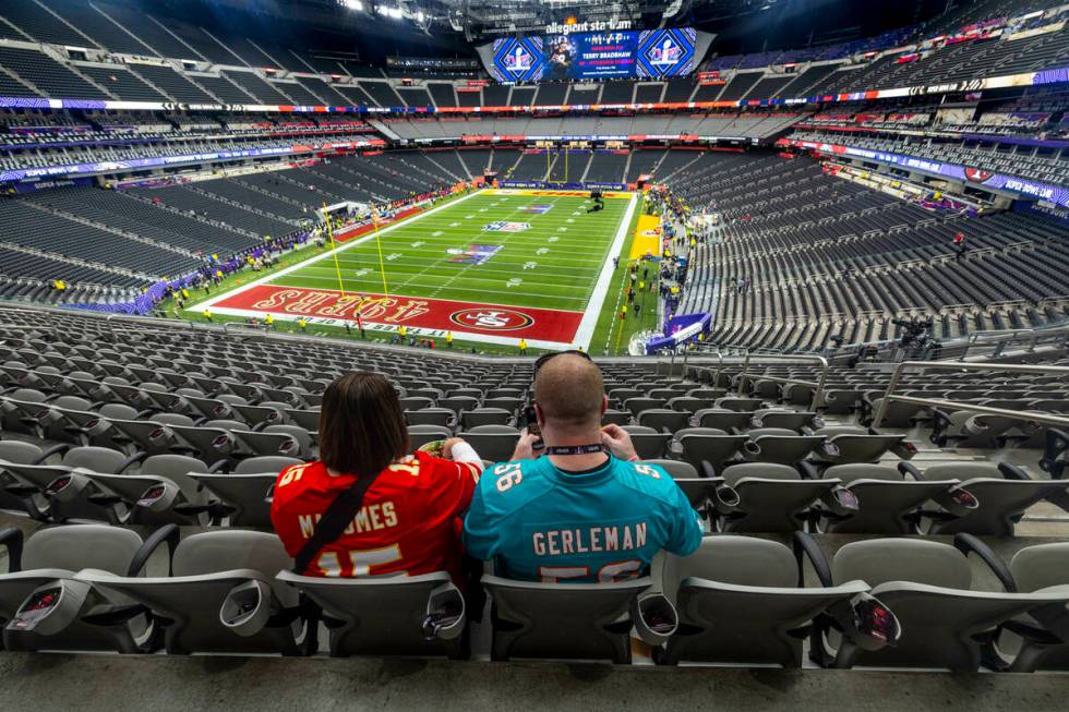 Adam and Kayla Gerleman of Des Moines are the first in the stands enjoying some lunch before th ...