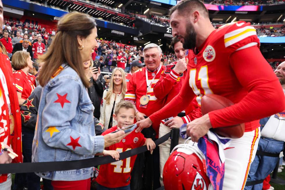 Kansas City Chiefs long snapper James Winchester (41) visits with friends and family before Sup ...
