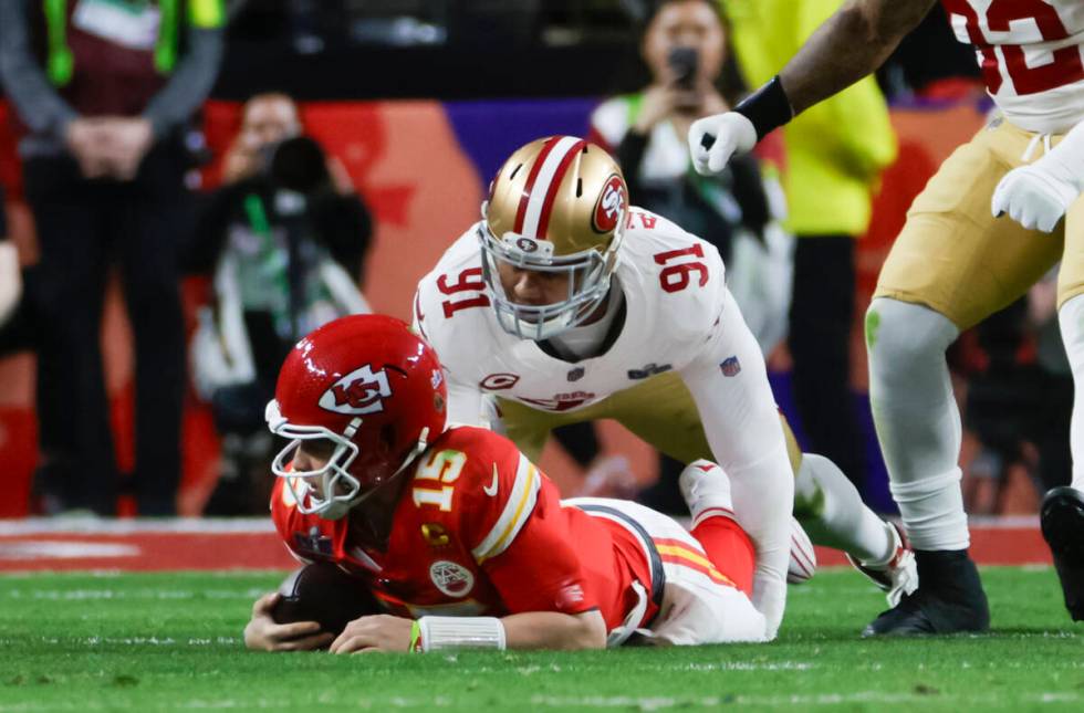 San Francisco 49ers defensive end Arik Armstead (91) sacks Kansas City Chiefs quarterback Patri ...