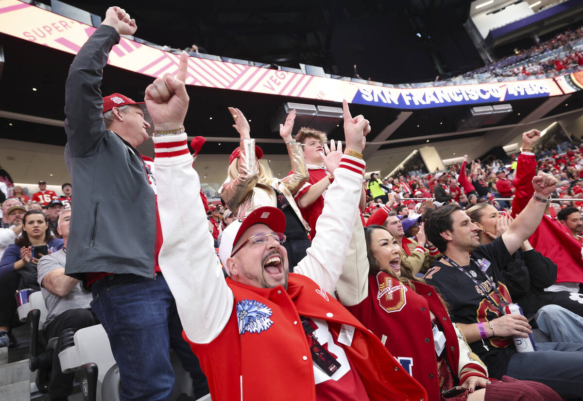 Fans cheer during the first half of Super Bowl 58 at Allegiant Stadium on Sunday, Feb. 11, 2024 ...