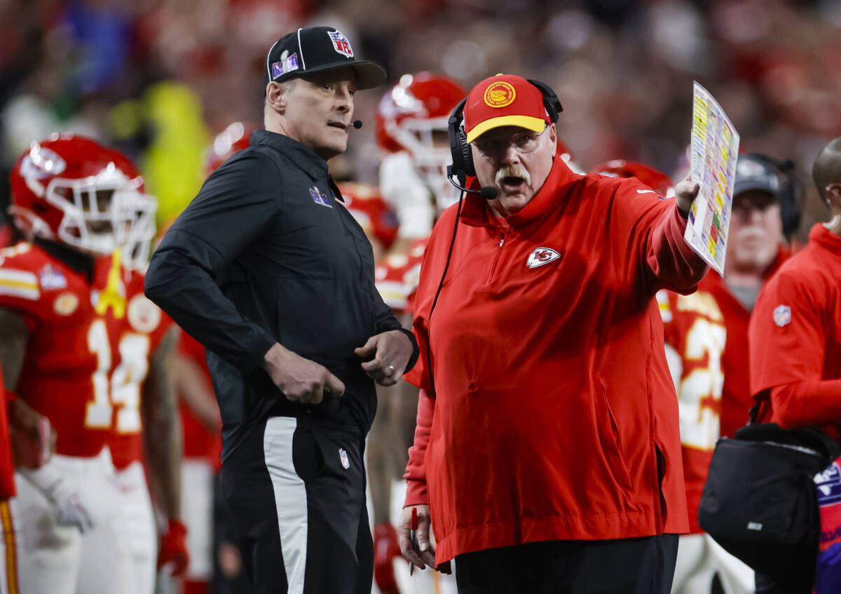 Kansas City Chiefs head coach Andy Reid talks with a referee during the first half of Super Bow ...