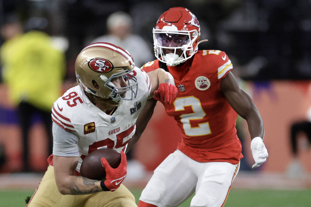 San Francisco 49ers tight end George Kittle (85) is pursued by Kansas City Chiefs cornerback Jo ...