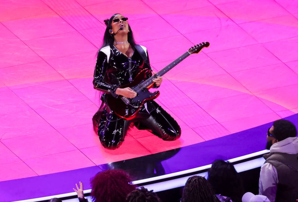 H.E.R. performs during the halftime show at Super Bowl 58 at Allegiant Stadium on Sunday, Feb. ...