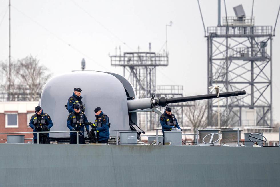 The frigate "Hessen" leaves the port at Wilhelmshaven, Germany, Thursday, Feb. 8, 202 ...