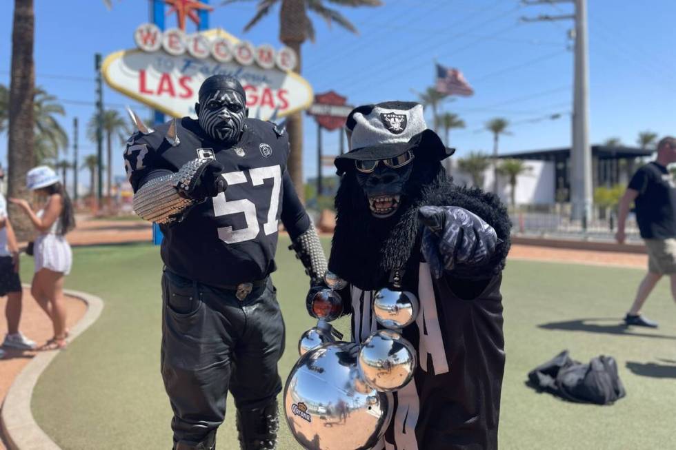 Two notable members of the Raiders infamous Black Hole stopped by the Welcome to Las Vegas sign ...