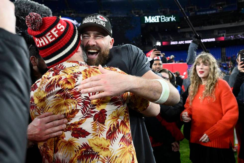 Jason Kelce embraces his brother Kansas City Chiefs tight end Travis Kelce after the AFC Champi ...