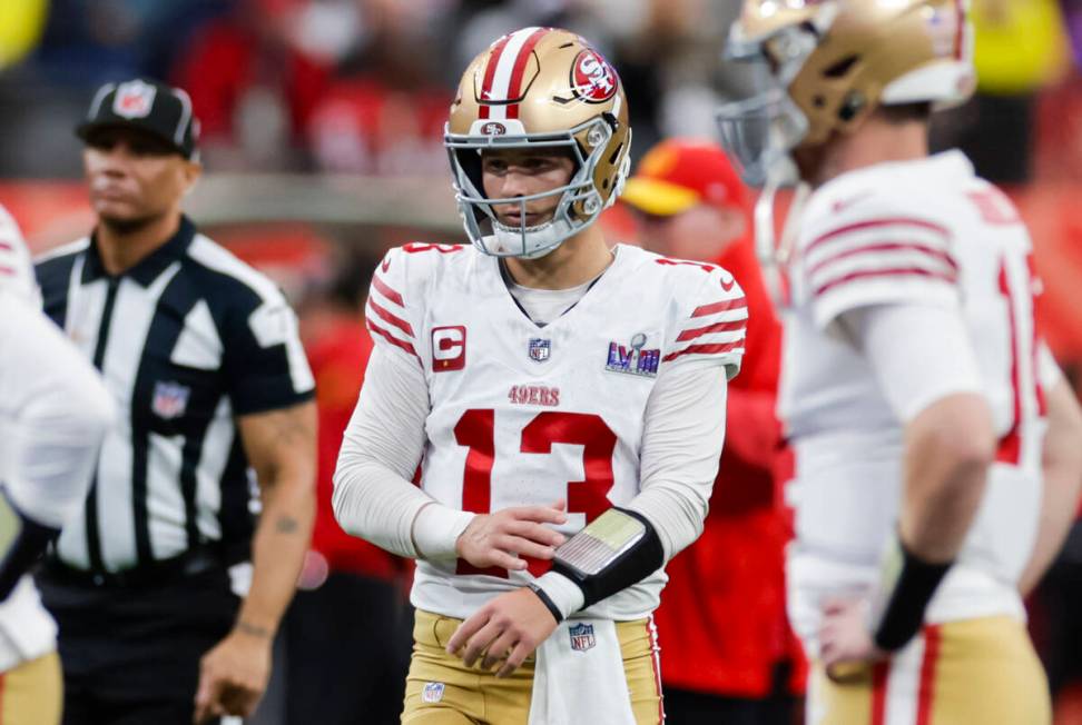 San Francisco 49ers quarterback Brock Purdy warms up before the start of Super Bowl 58 at Alle ...