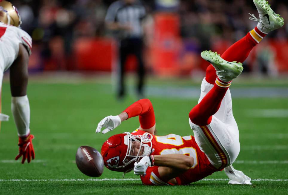 Kansas City Chiefs wide receiver Justin Watson (84) loses hold of a pass during the first half ...