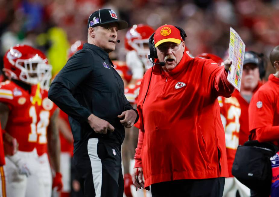 Kansas City Chiefs head coach Andy Reid talks with a referee during the first half of Super Bow ...