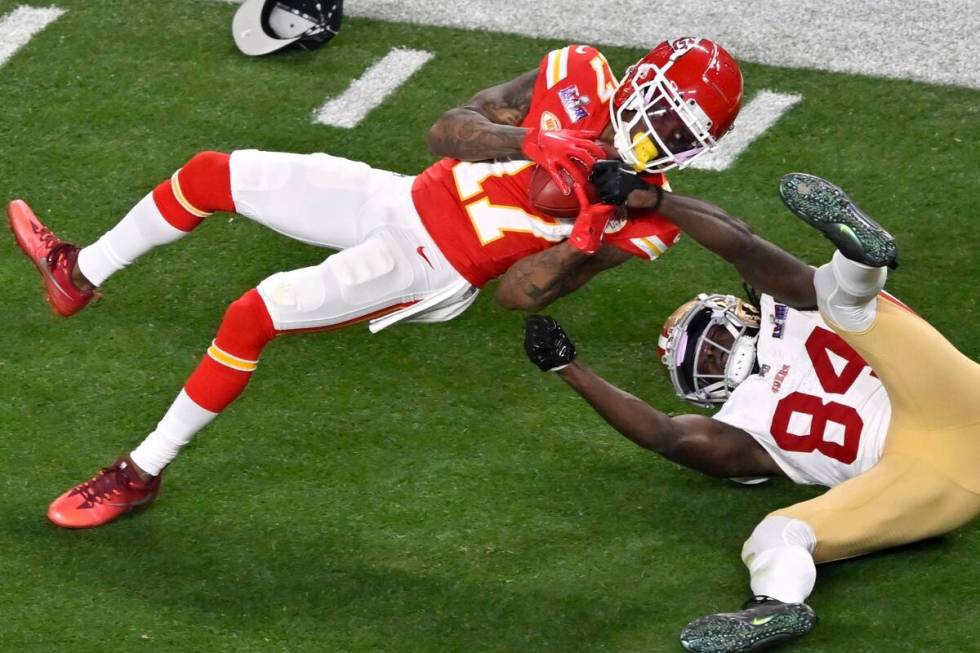 Kansas City Chiefs wide receiver Richie James (17) is tackled by San Francisco' Chris Conley (8 ...