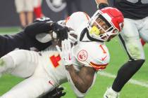 Raiders cornerback Sidney Jones IV (31) tackles Kansas City Chiefs running back Jerick McKinnon ...