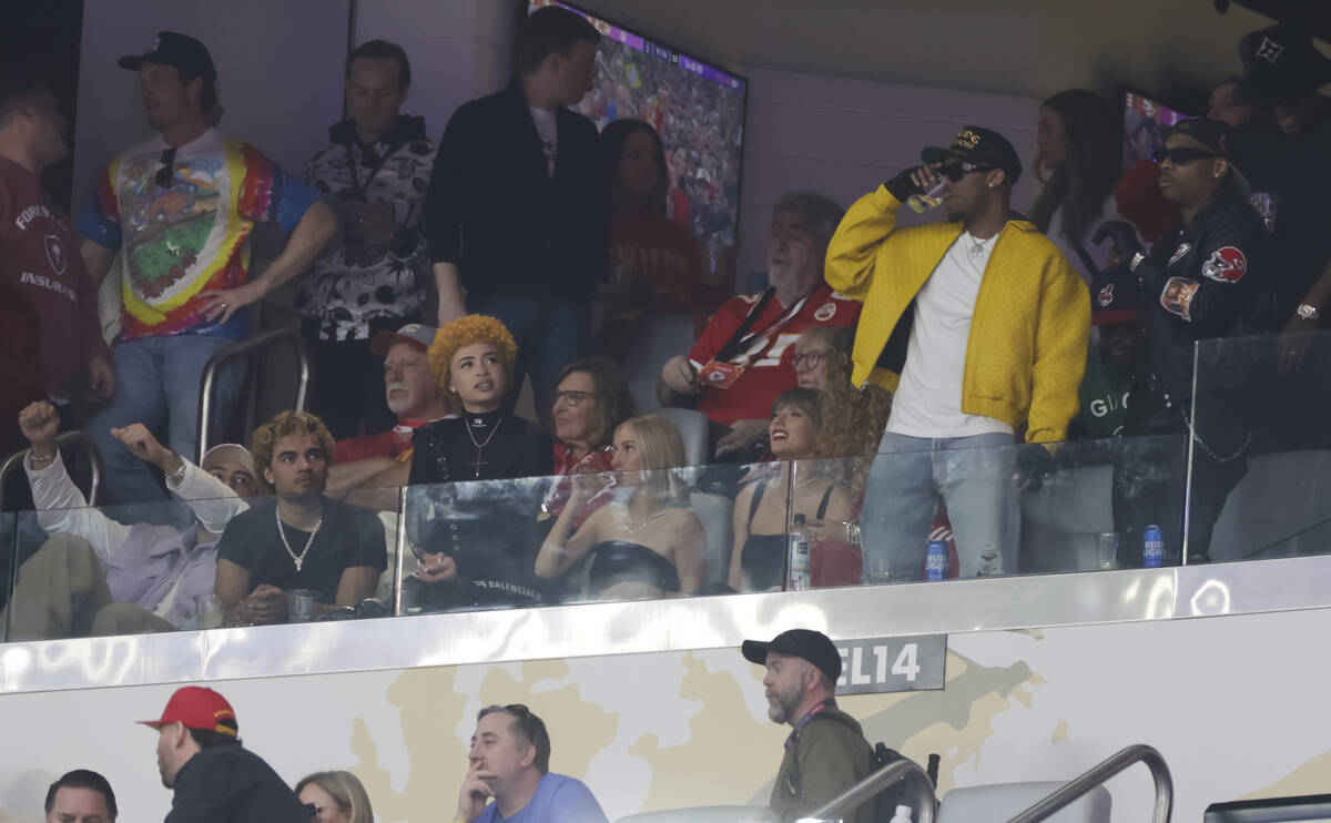 Taylor Swift, center right, looks on during the first half of Super Bowl 58 between the Kansas ...