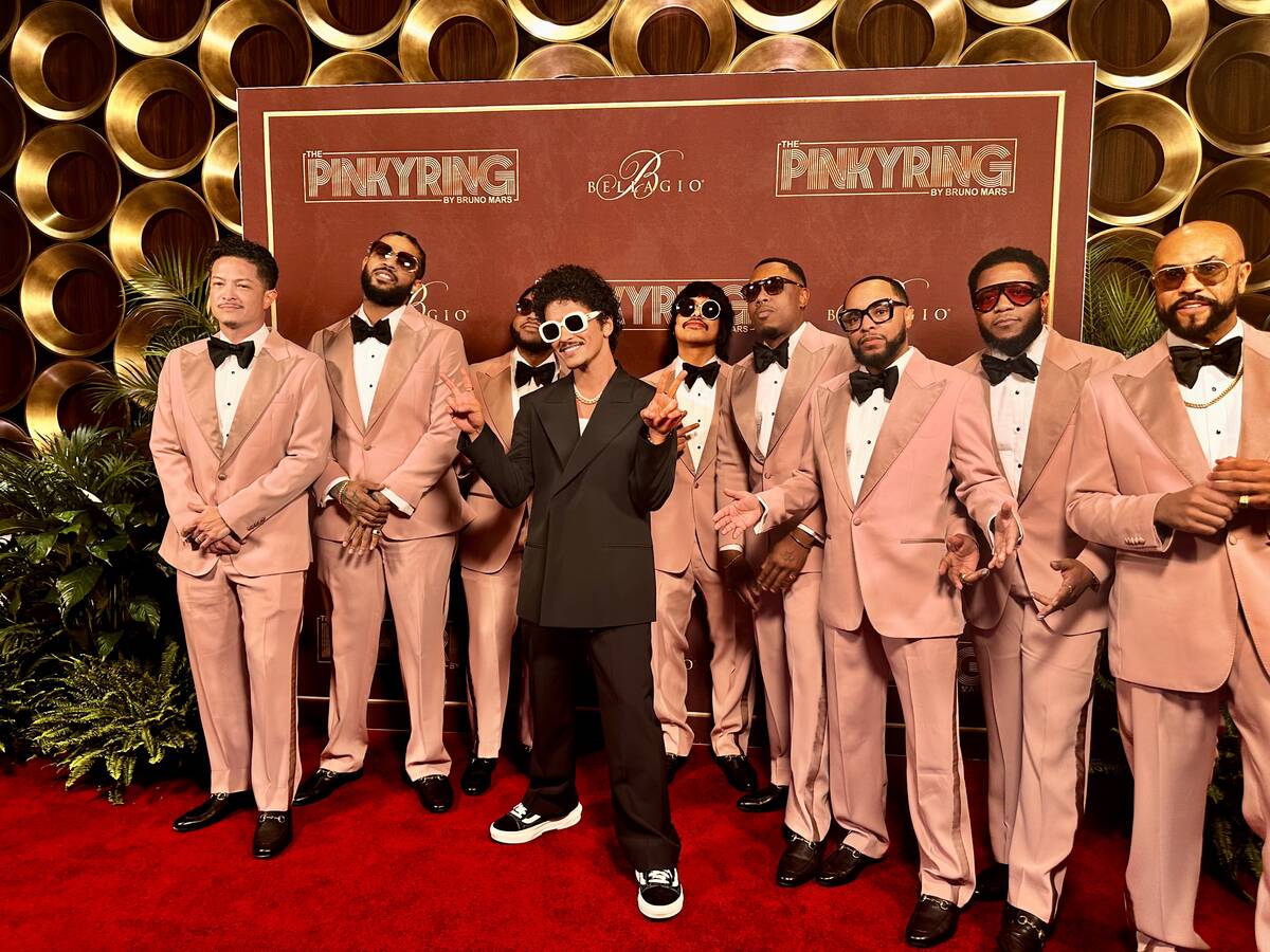 Bruno Mars and the Hooligans are shown at the VIP opening of The Pinkyring at Bellagio on Satur ...