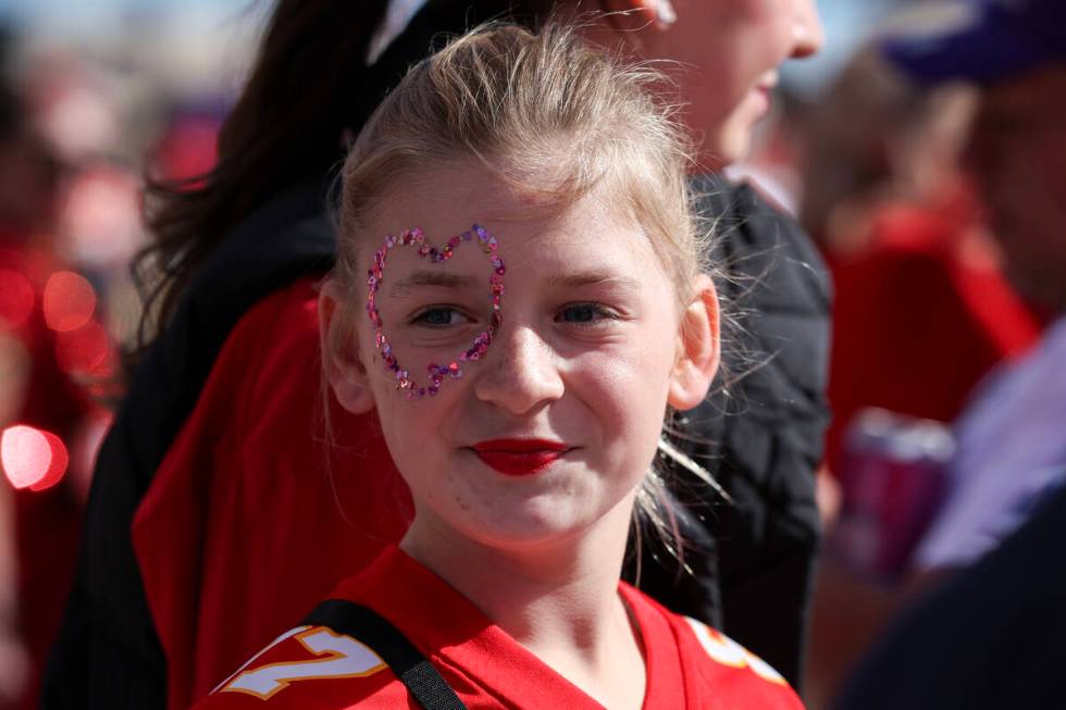 A Kansas City Chiefs fan wears a Travis Kelce Jersey before the NFL Super Bowl 58 football game ...