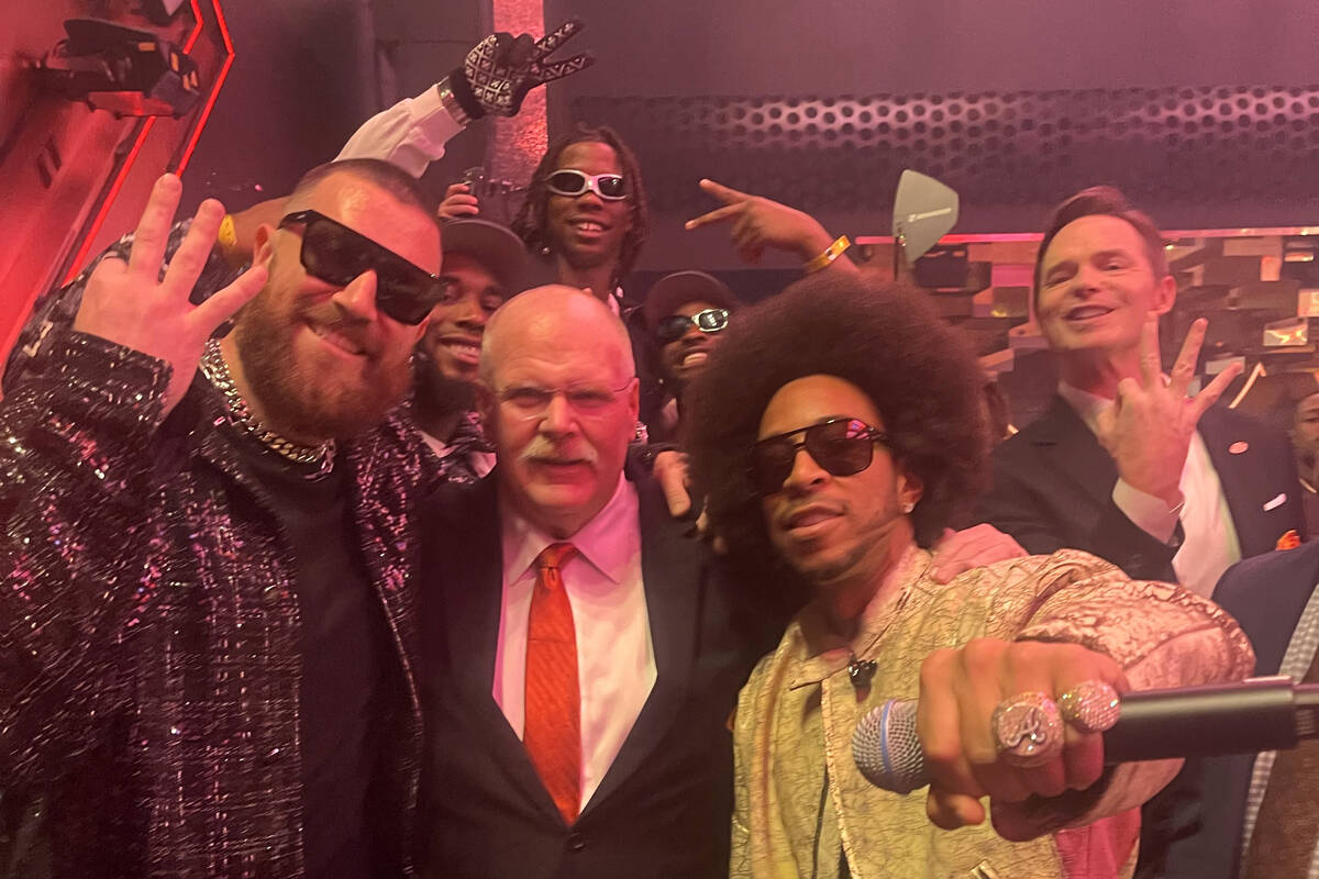 Travis Kelce and Andy Reid pose for a picture with Ludacris at Zouk nightclub at Resorts World ...