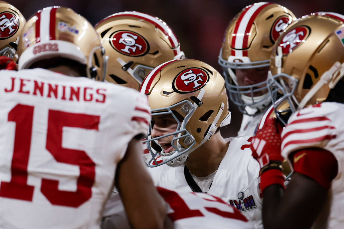 San Francisco 49ers quarterback Brock Purdy huddles with teammates during the first half of Sup ...