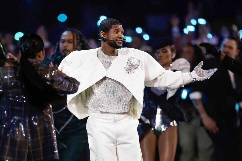 Usher perforrms at halftime of Super Bowl LVIII at Allegiant Stadium in Las Vegas on Sunday, Fe ...