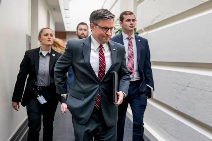 Speaker of the House Mike Johnson, R-La., arrives for a closed-door GOP caucus meeting, at the ...