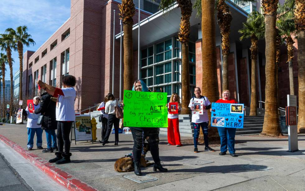 Family and supporters of Jonathan Lewis, killed in a beating near Rancho High School, rally out ...