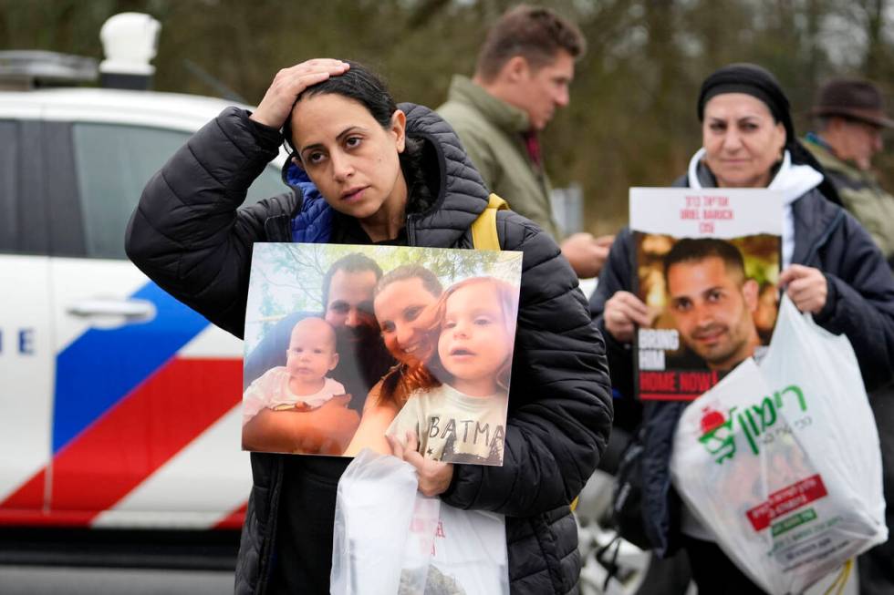 Families of hostages and former hostages arrive near the International Crime Court at The Hague ...