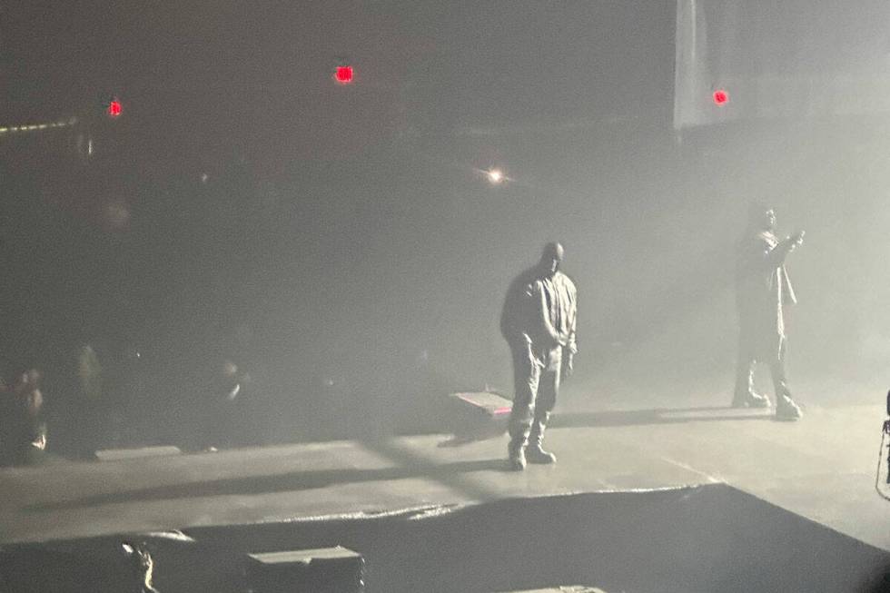 In this image provided by a spectator, Kanye West and Ty Dolla $ign are shown at a temporary ve ...