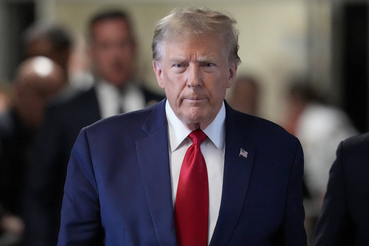 Former President Donald Trump arrives at Manhattan criminal court, Thursday, Feb. 15, 2024, in ...