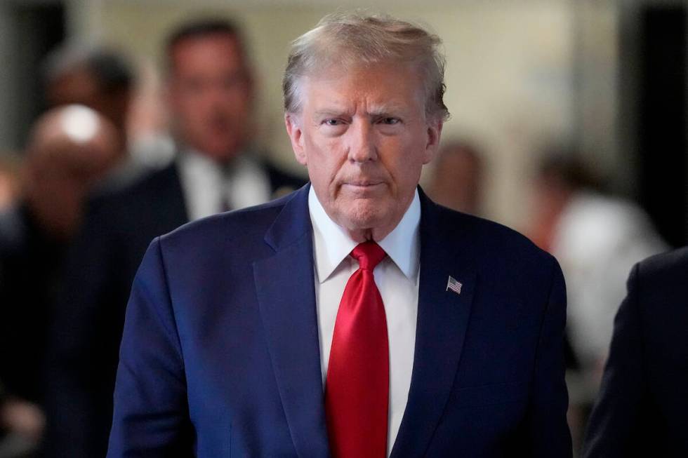 Former President Donald Trump arrives at Manhattan criminal court, Thursday, Feb. 15, 2024, in ...