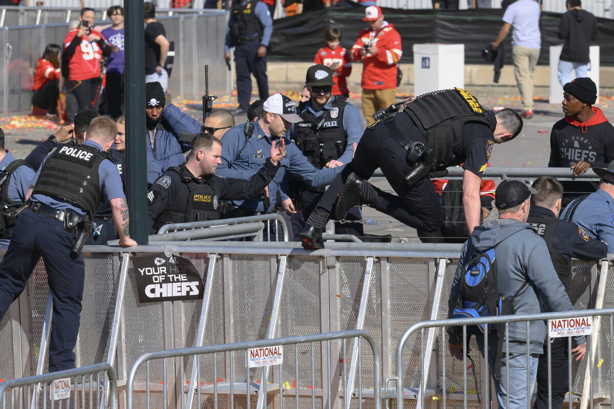 Law enforcement personnel clear the area around Union Station following a shooting at the Kansa ...