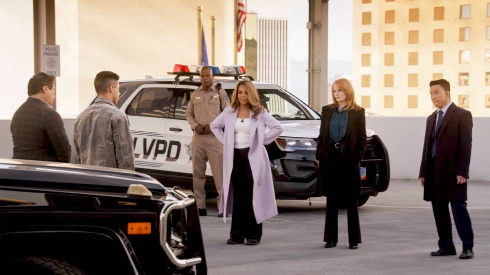 Paula Newsome, Marg Helgenberger and Reggie Lee film a scene atop Circa's Garage Mahal for the ...