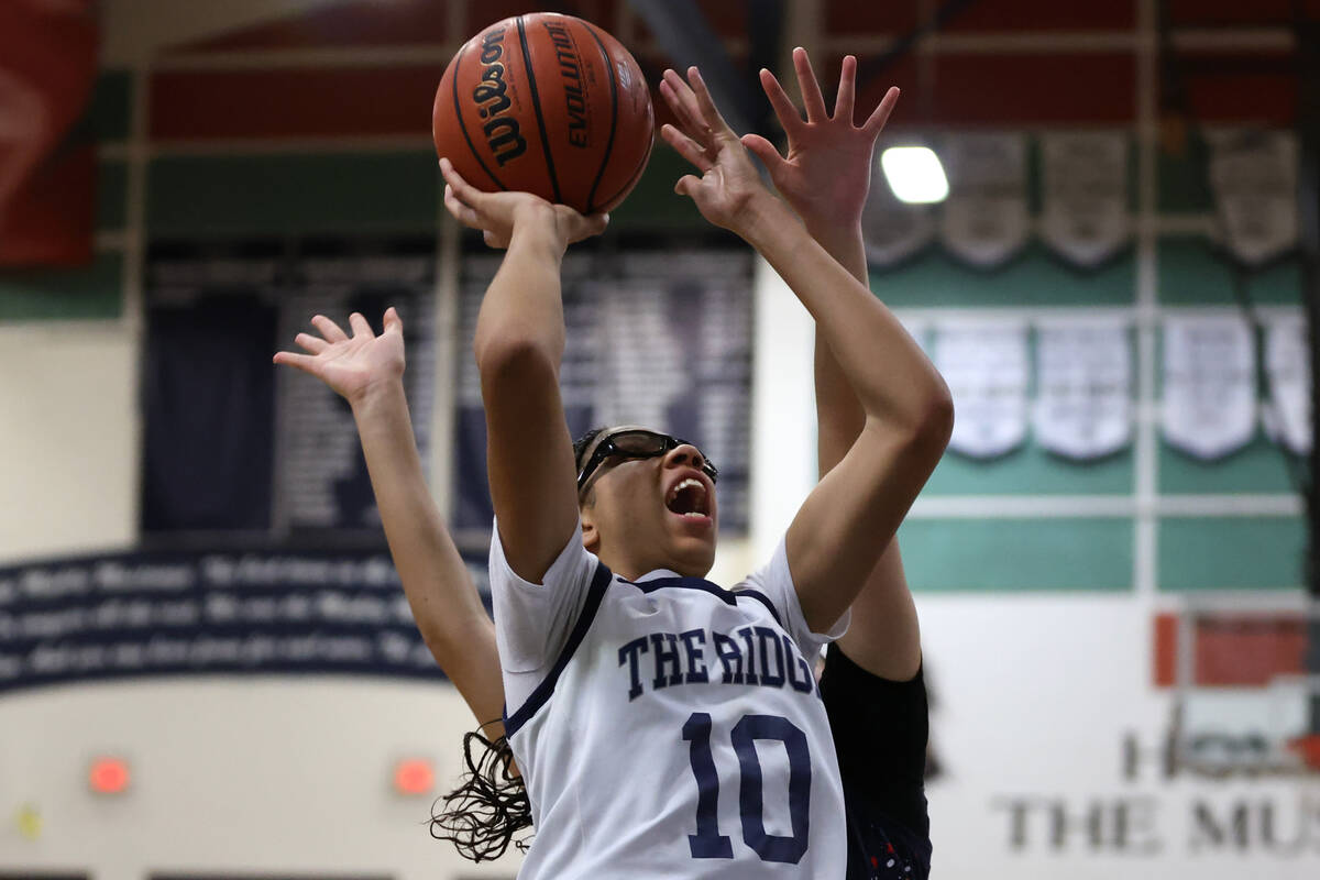 Shadow Ridge forward Jaslyn Jefferson (10) shoots against Liberty's during the second half of a ...