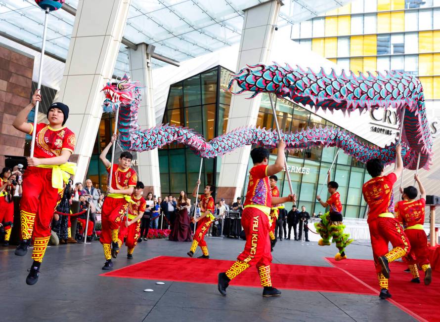 Members of Yau Kung Moon perform the Chinese Dragon and Lion dance to commemorate Lunar New Yea ...