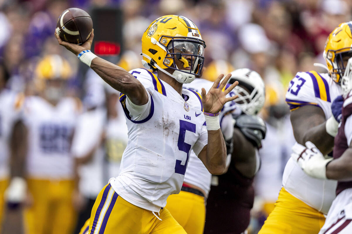 FILE - LSU quarterback Jayden Daniels (5) throws the ball against Mississippi State during the ...