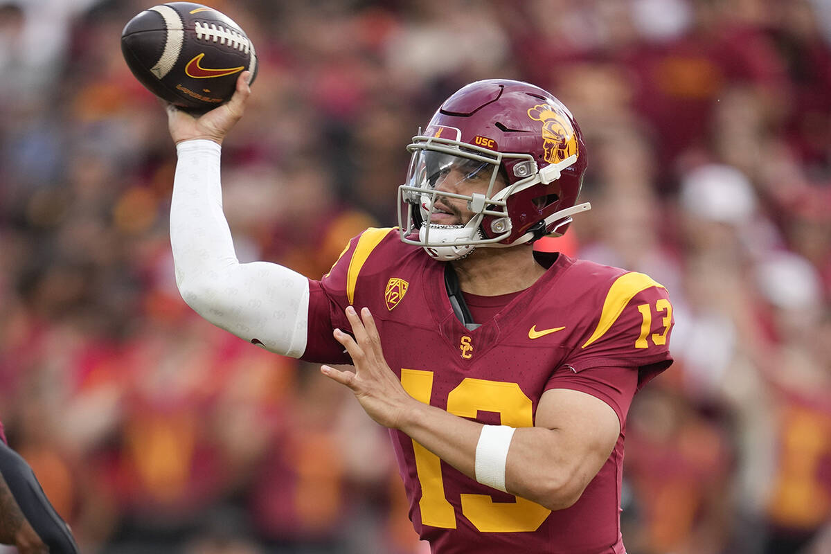 Southern California quarterback Caleb Williams (13) throws during the first half of an NCAA col ...