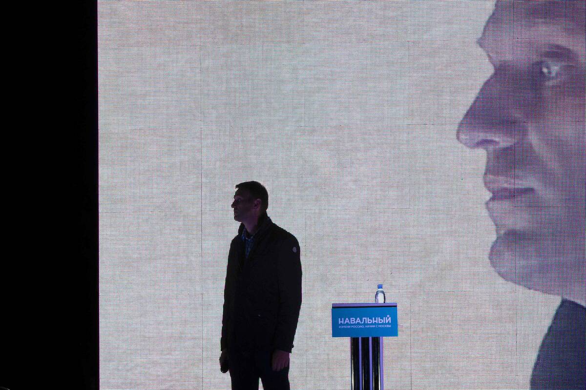 FILE - Alexei Navalny speaks to supporters in Sokolniki park in Moscow, Russia on Aug. 25, 2013 ...