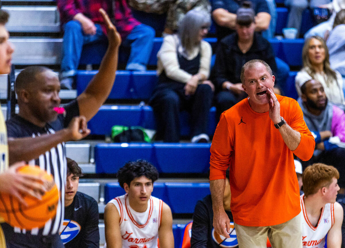 Bishop Gorman's head coach Grant Rice questions an official's call against Foothill during the ...