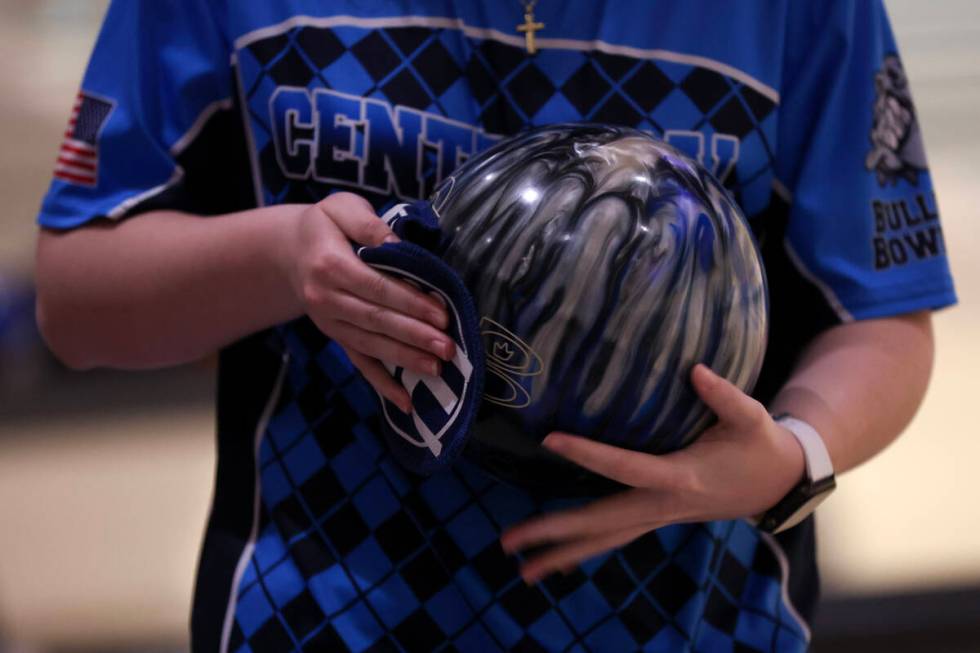 Centennial’s Sophie Wood prepares her ball before throwing during the Class 5A state bow ...