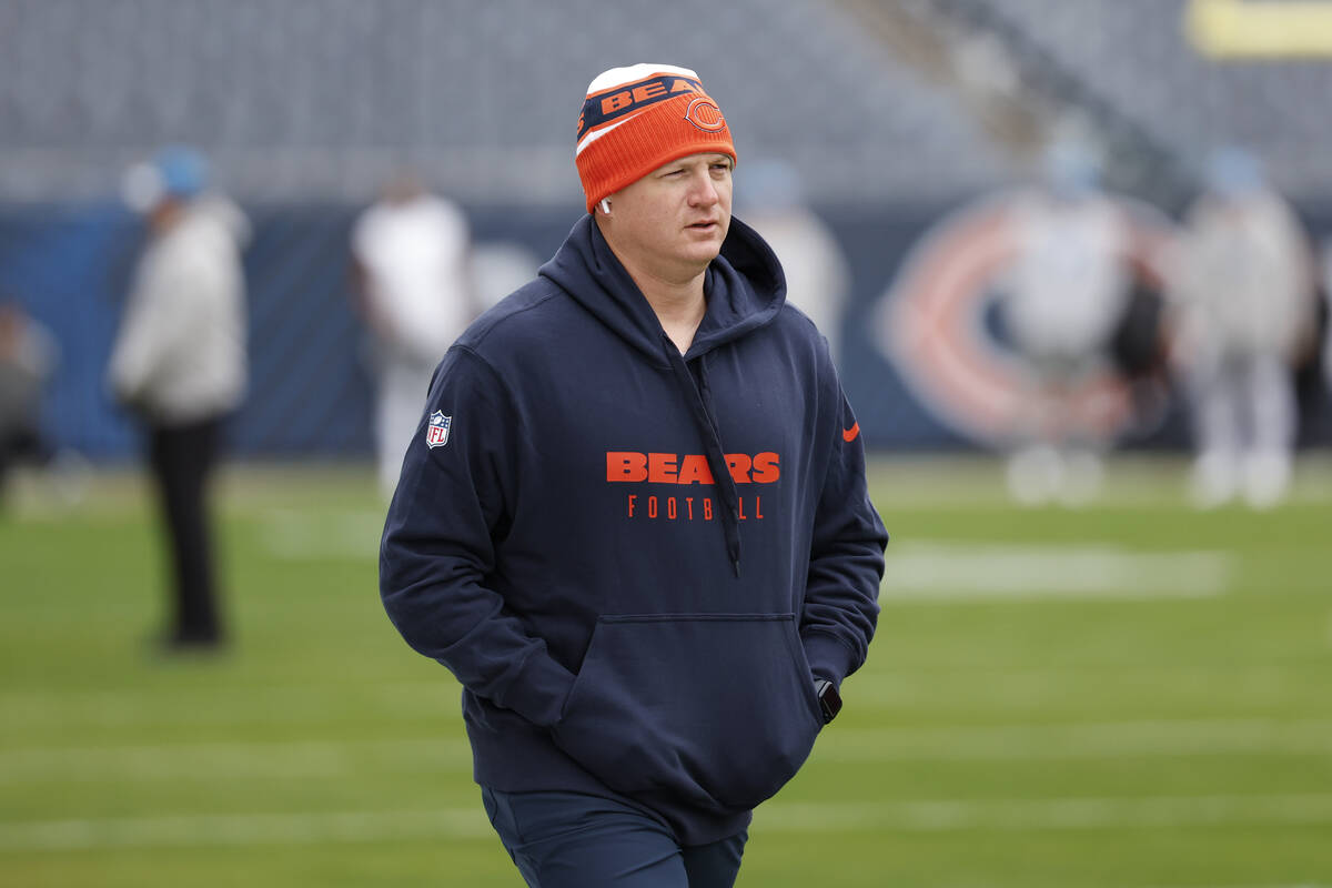 FILE - Chicago Bears offensive coordinator Luke Getsy walks on the field before an NFL football ...