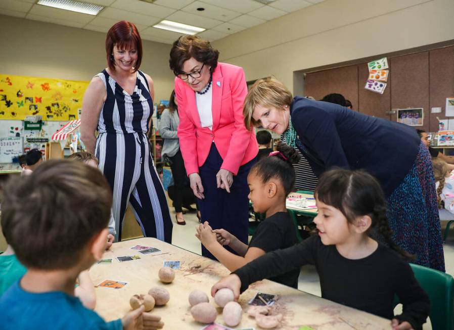 Brianna Barber, executive director, left, Sen. Jackie Rosen, D-Nev., center, and U.S. Rep. Susi ...