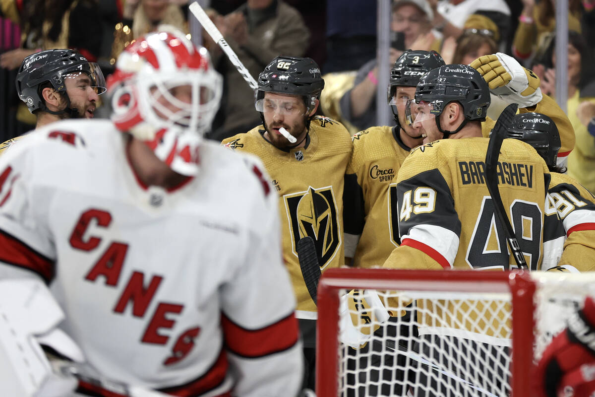 The Golden Knights celebrate a goal during the first period of an NHL hockey game against the H ...