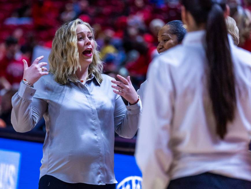 UNLV Lady Rebels head coach Lindy La Rocque talks with coaches from the Air Force Falcons befor ...
