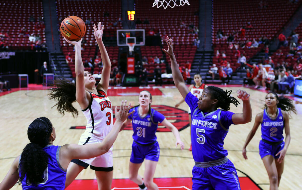 UNLV Lady Rebels guard Kiara Jackson (3) elevates for a shot as Air Force Falcons guard Jayda M ...