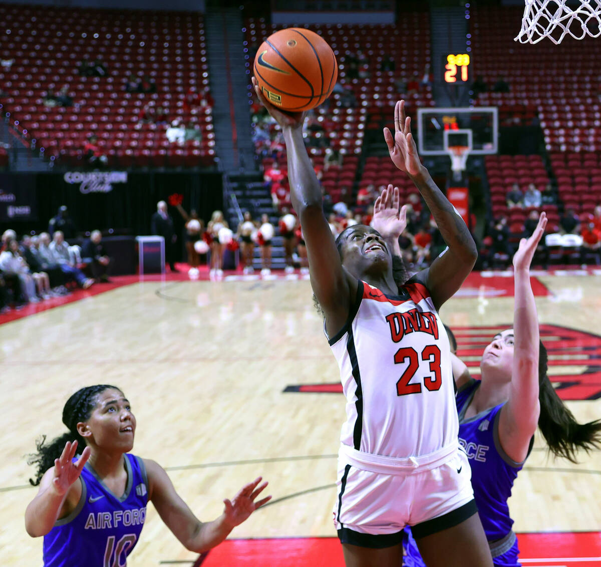 UNLV Lady Rebels center Desi-Rae Young (23) elevates for a shot as Air Force Falcons guard Jayd ...