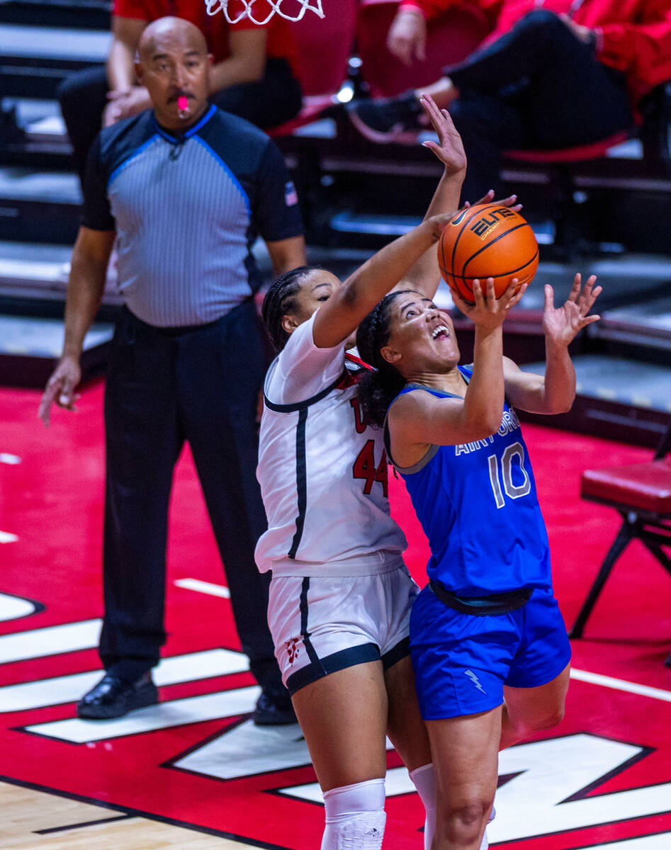 UNLV Lady Rebels forward Alyssa Brown (44) blocks a shot attempt by Air Force Falcons guard Jay ...